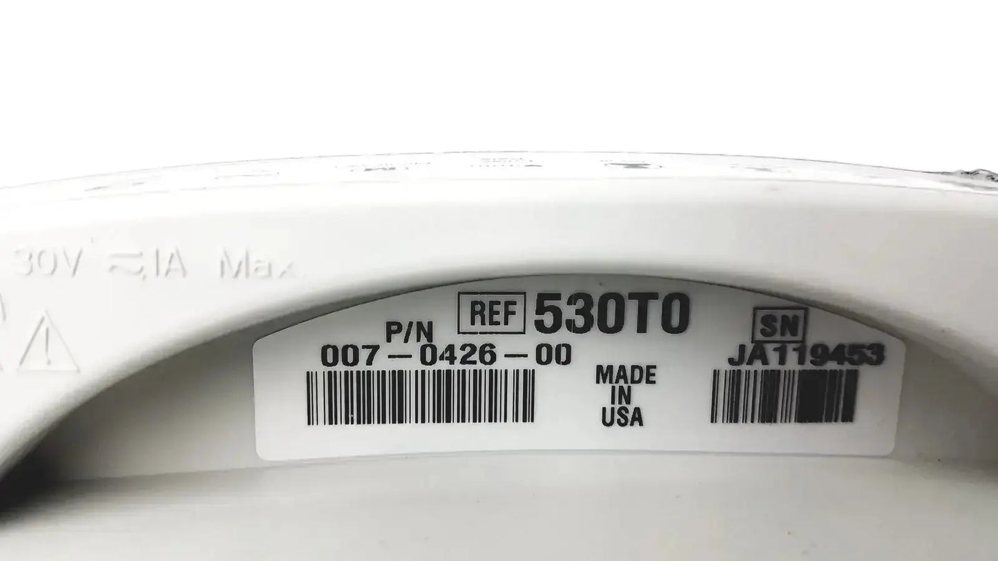 White plastic electrical component with molded label showing part number 530to on the welch allyn 530t0 patient monitor
