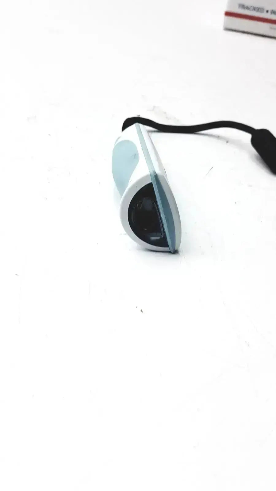 Light blue and white plastic welch allyn 6000-916hs barcode scanner with black cable attached for barcode reading