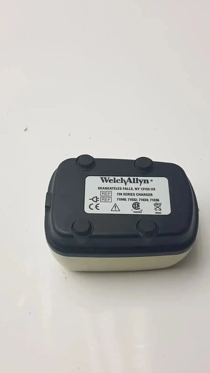 Black and beige Welch Allyn 739 series charger with compact rectangular design for used medical equipment for sale