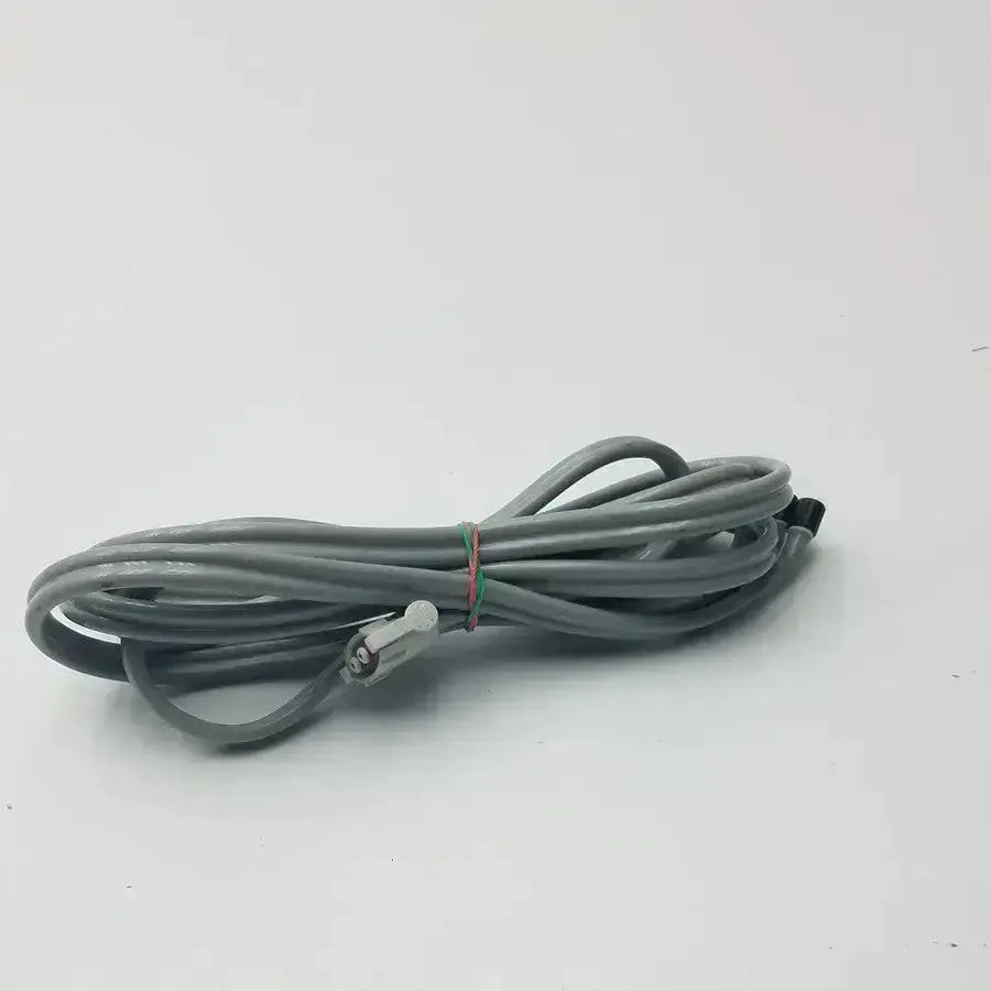 Gray welch allyn blood pressure hose with locking connector double-tube coiled and secured with red and green rubber band