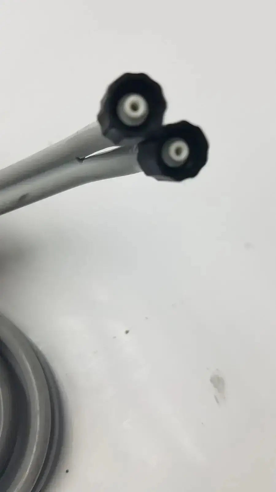 Gray welch allyn blood pressure hose with black locking connector and double-tube hexagonal ends for secure fit