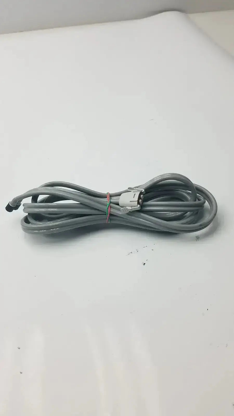 Gray welch allyn blood pressure hose with locking connector, double-tube design, white connector, and black end cap
