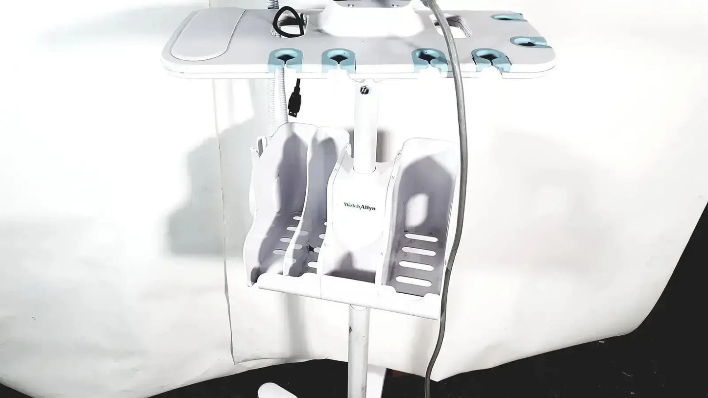 White plastic hair styling station with light blue accents and slots for tools compatible with welch allyn connex vital signs monitor