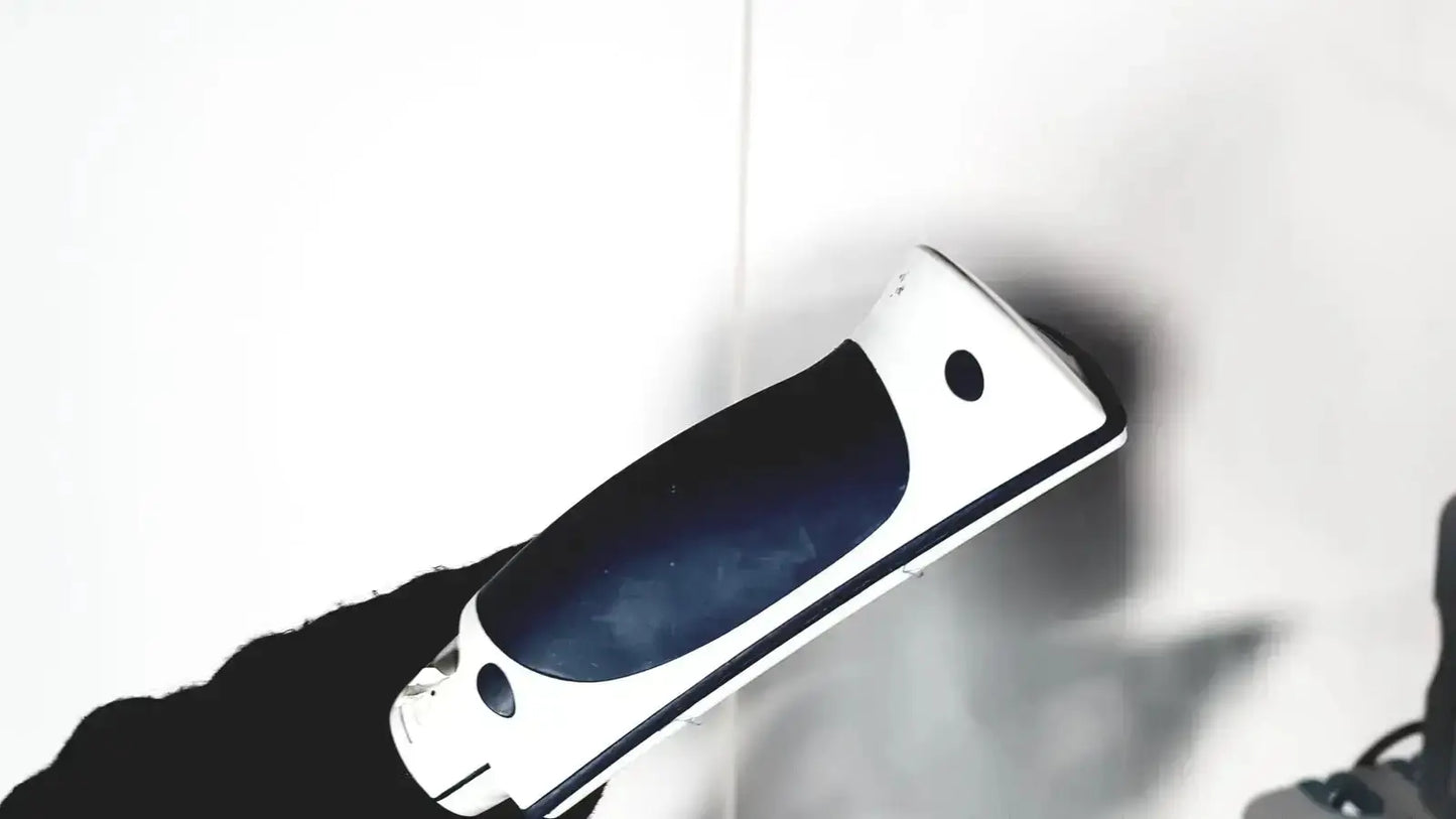 White and black handheld scraper with textured grip for cleaning in welch allyn connex vital signs monitor 6000 series wireless