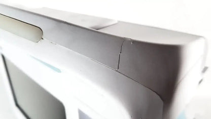 Gray plastic casing with visible seam and slight crack on the back side of welch allyn connex vital signs monitor 6000 series
