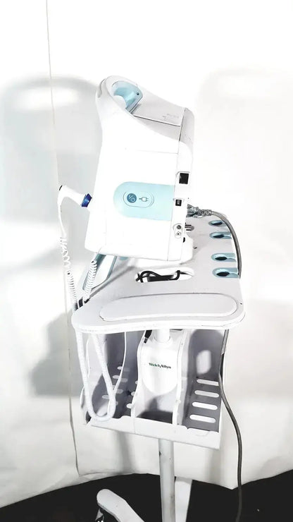 White and light blue welch allyn connex vital signs monitor 6000 series wireless mounted on adjustable stand cart