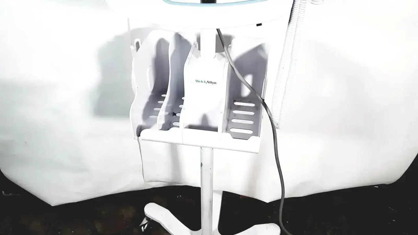 White plastic salon chair organizer with compartments and central tool slot for welch allyn connex vital signs monitor 6000 series