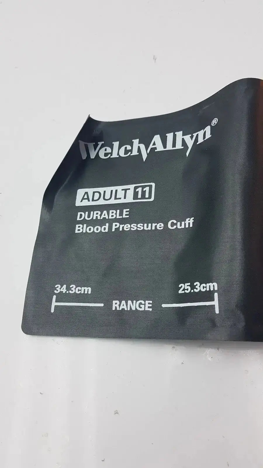 Black welch allyn durable blood pressure cuff adult 11 with white text and measurements for accurate blood pressure monitoring