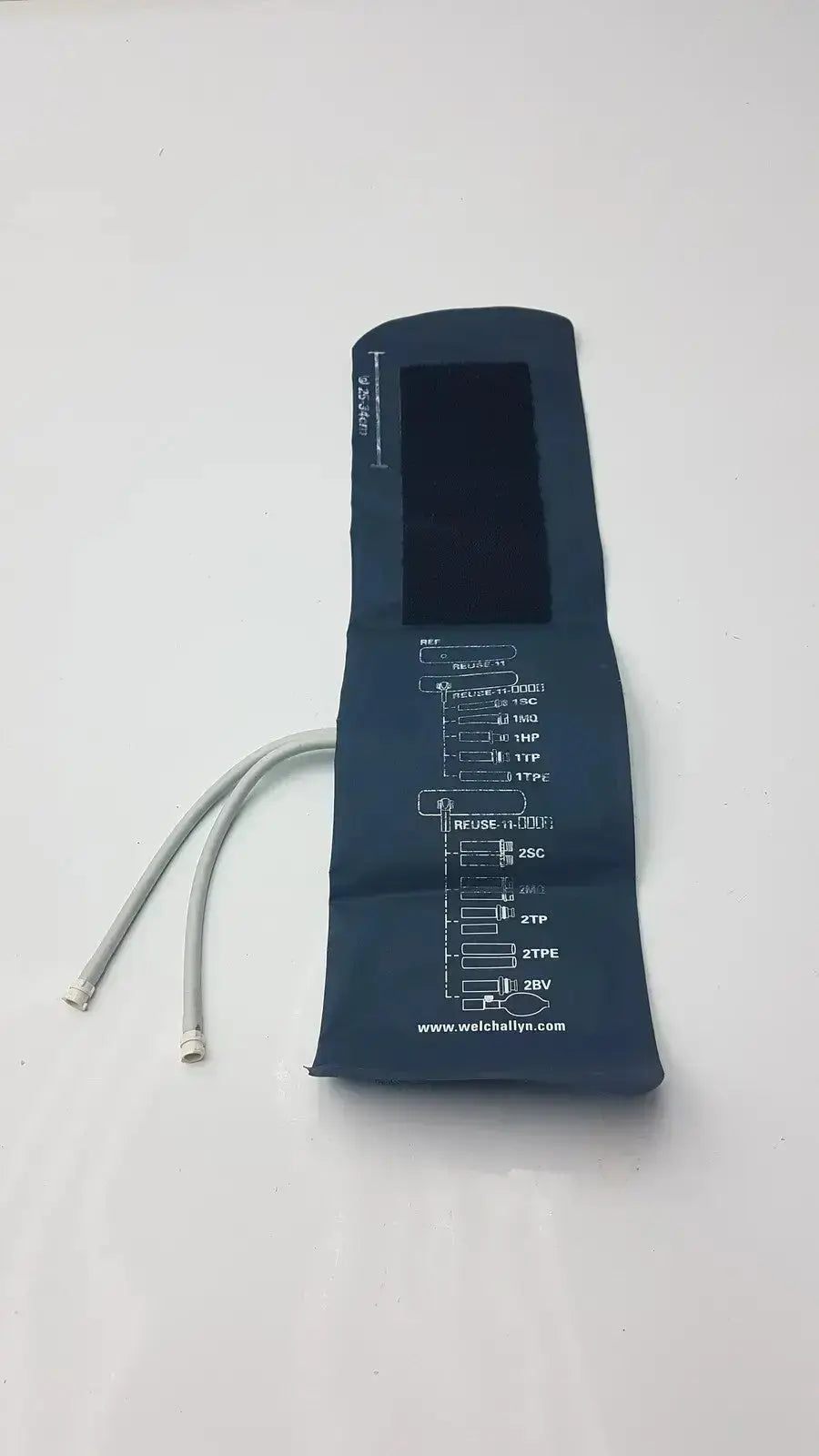 Welch Allyn FlexiPort dark blue reusable blood pressure cuff with white markings and tubing for adult 25cm to 34cm
