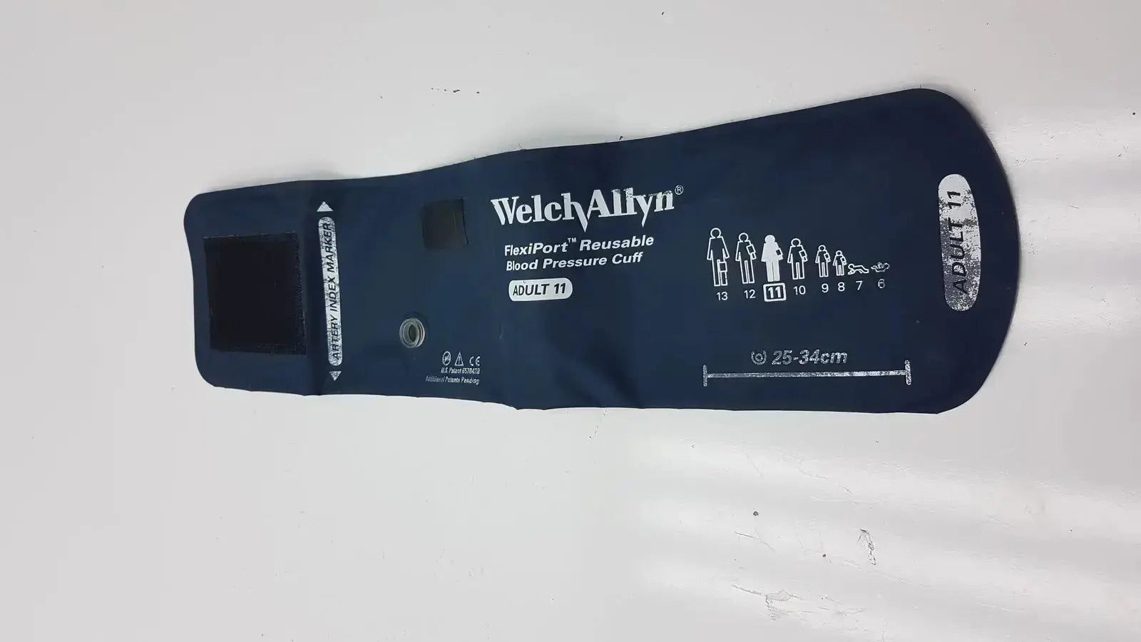Dark blue welch allyn flexiport reusable blood pressure cuff adult size 11 model g-bbdc4-11j for medical use