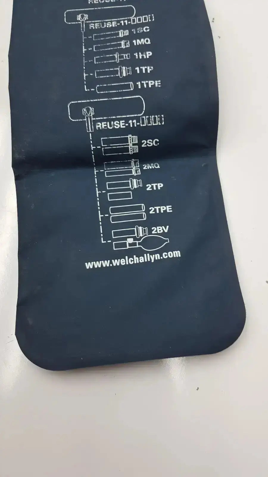 Dark blue fabric pouch for welch allyn flexiport reusable blood pressure cuff adult 11 with fuse type diagram and website