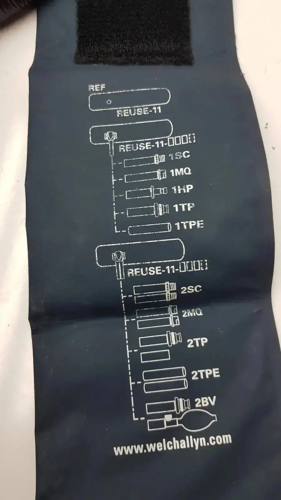 Dark blue welch allyn flexiport reusable blood pressure cuff pouch with white electrical schematic and reference codes g-bbdc4-11j