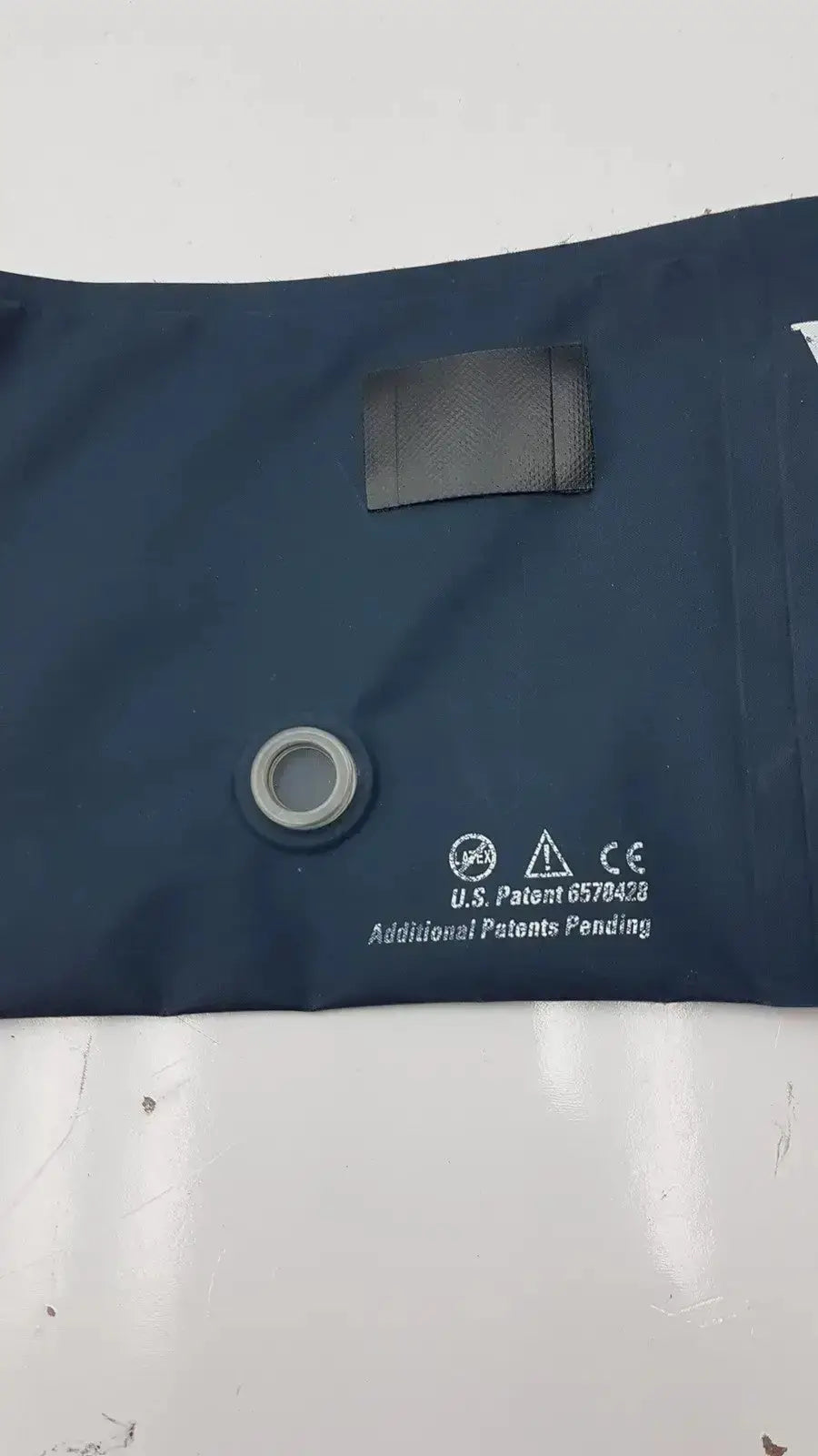 Dark blue medical-grade inflatable bladder with silver-rimmed valve for welch allyn flexiport g-bbdc4-11j cuff adult 11
