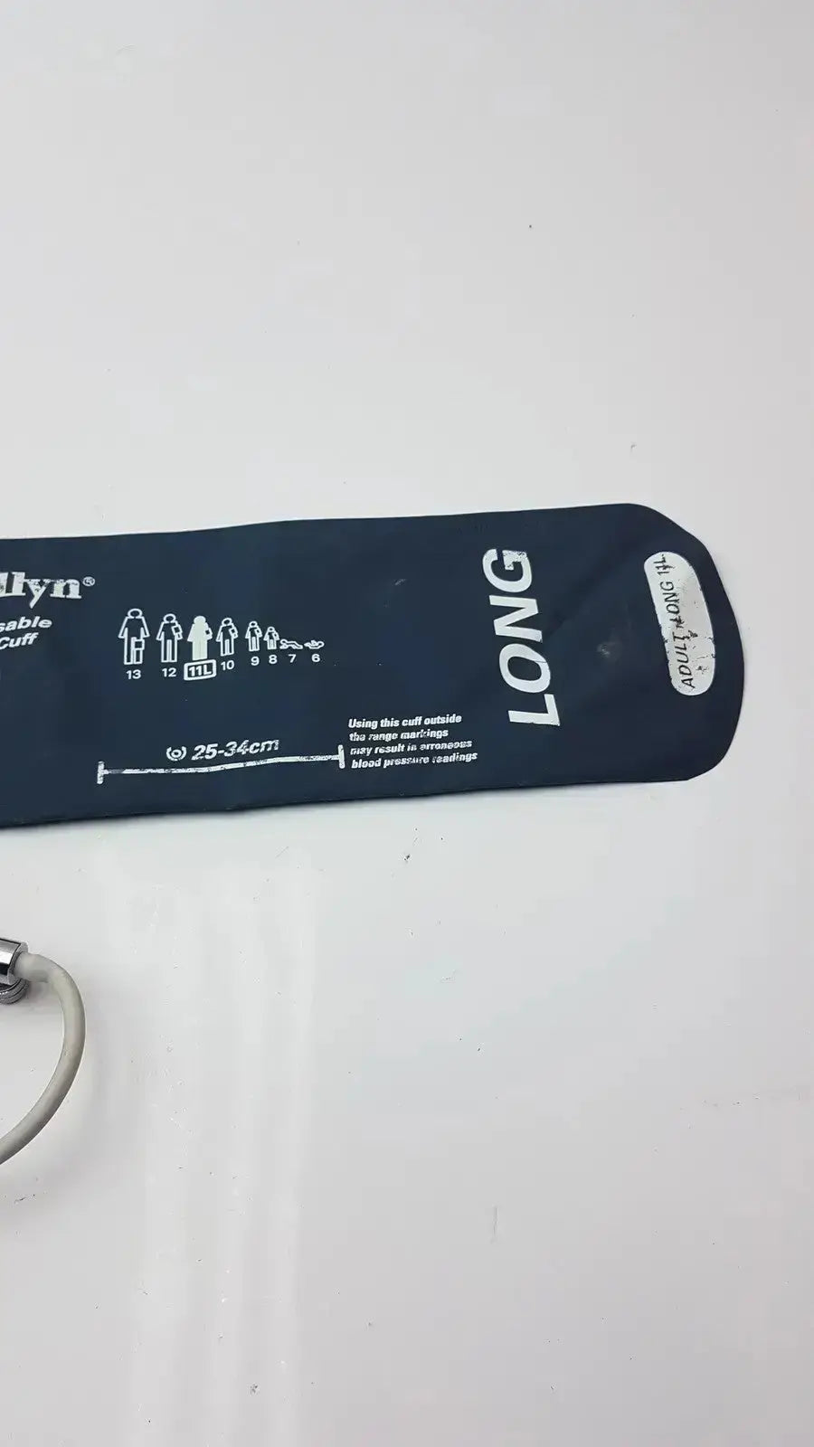 Navy blue welch allyn flexiport reusable blood pressure cuff long 11L with white sizing chart for adult use 25-34cm pressure cuff