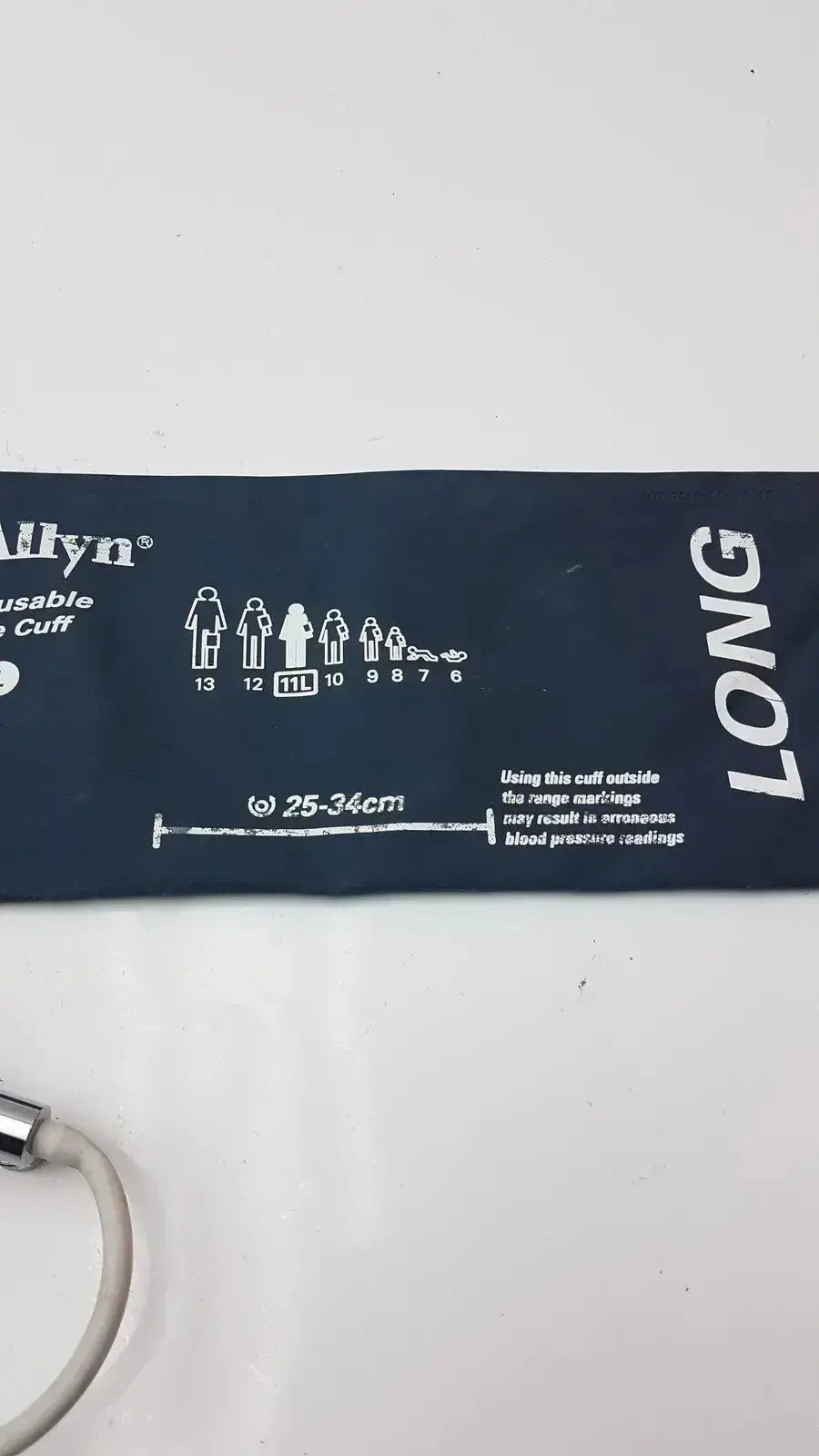 Navy blue Welch Allyn Flexiport reusable adult long blood pressure cuff 25-34cm with size chart and measurement markings
