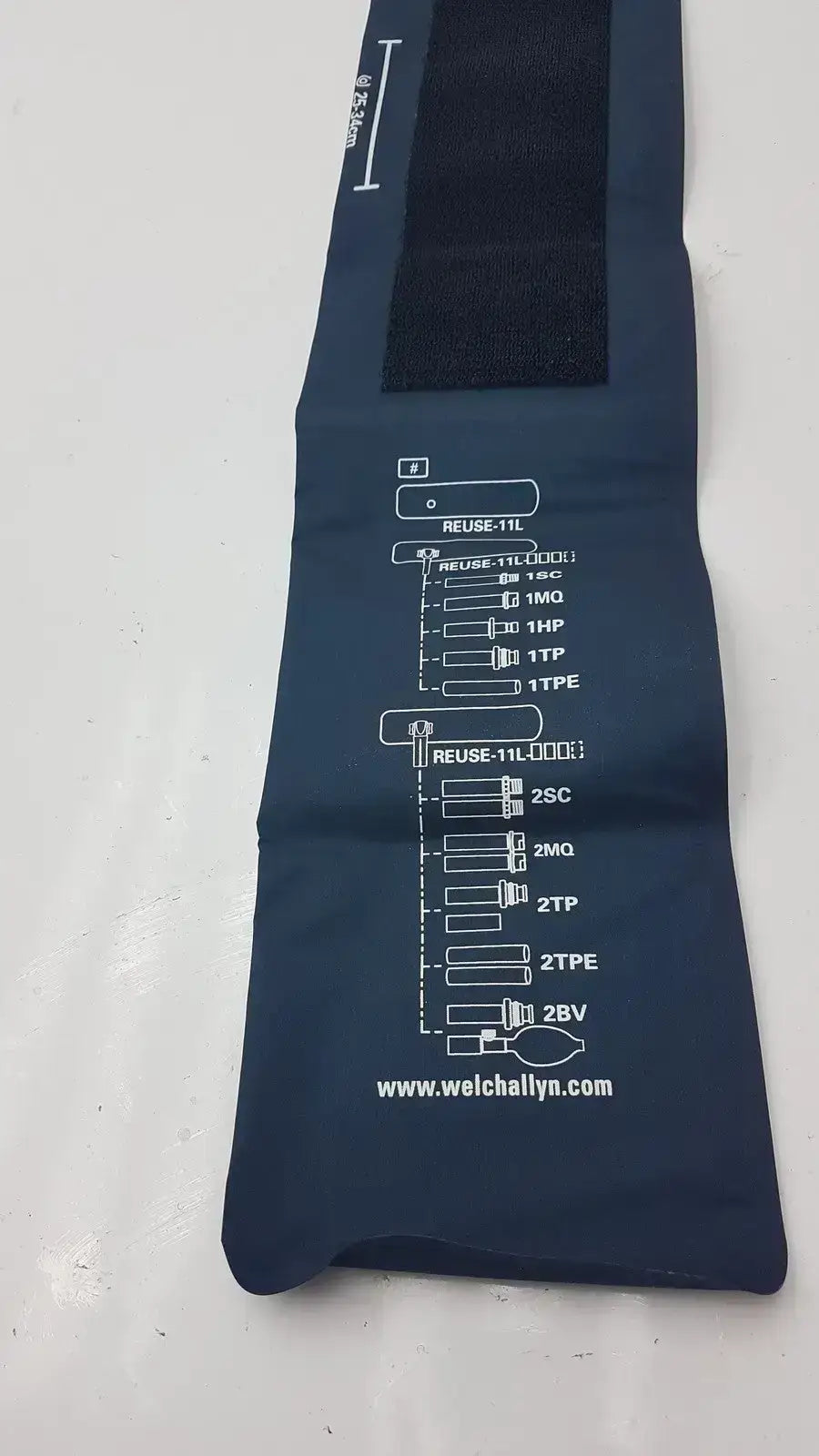 Dark blue welch allyn flexiport reusable blood pressure cuff adult long 11l with white printed sizing chart and brand website