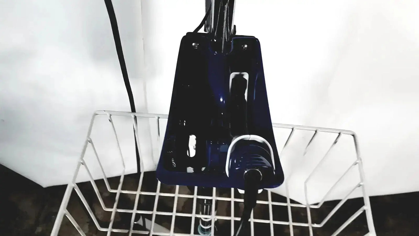 A sleek glossy black bicycle basket with metal frame and handlebar mount shown with welch allyn glidescope cobalt avl monitor