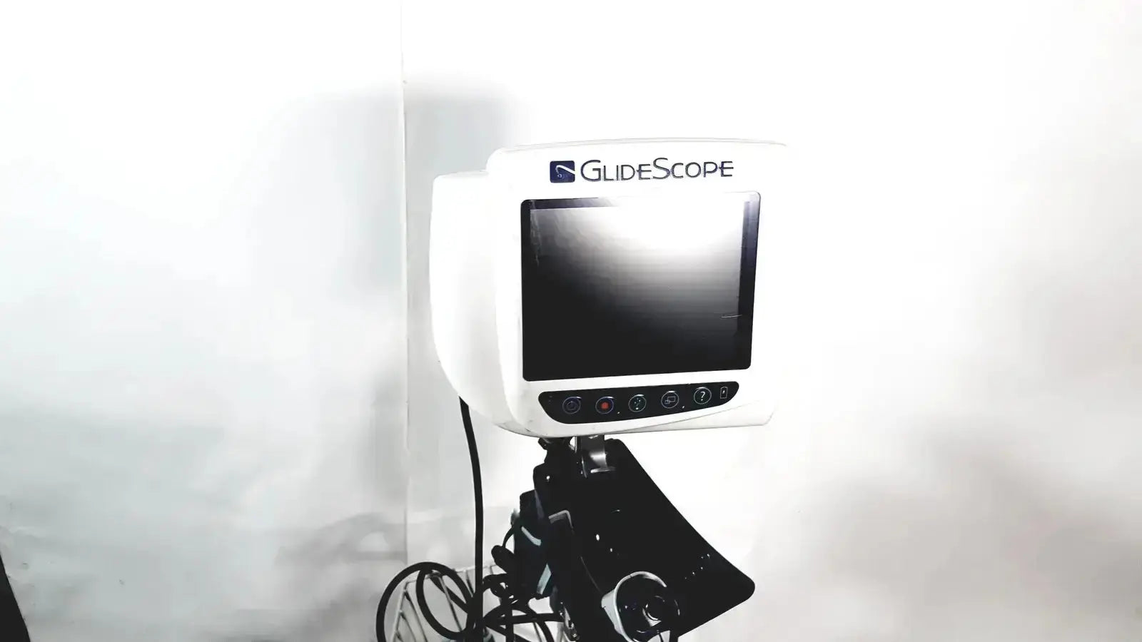 Welch allyn glidescope cobalt avl monitor in white with black screen and control buttons on cart and stand for medical use