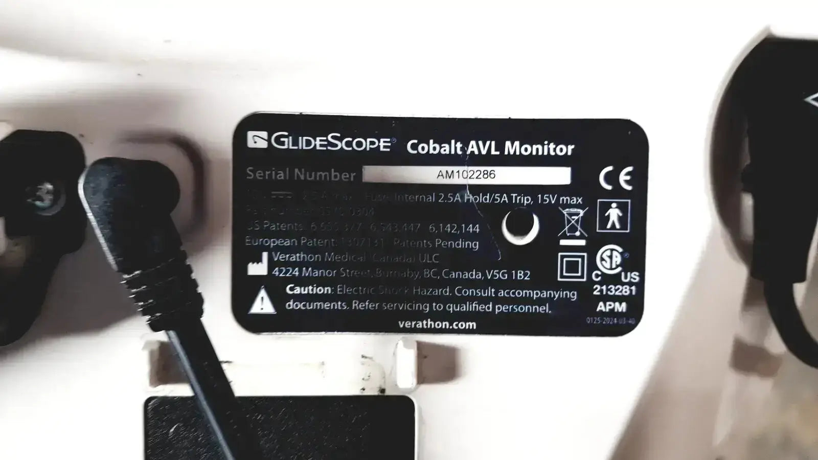 Black rectangular label with white text reading glidescope cobalt avl monitor on welch allyn glidescope medical device