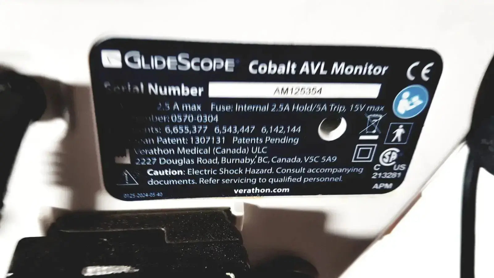Black rectangular label with white text showing glidescope cobalt avl monitor branding on welch allyn glidescope device