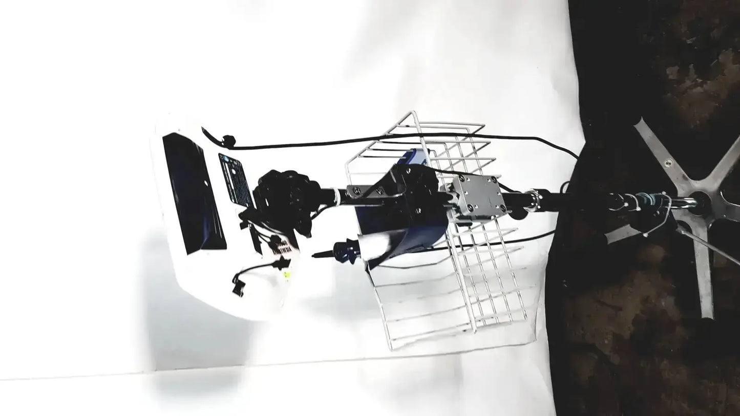 Back view of black and silver welch allyn glidescope cobalt avl monitor mounted on metal cage with cables and hardware