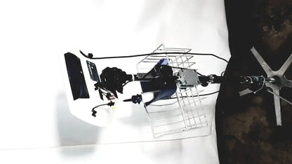 Back view of black and silver welch allyn glidescope cobalt avl monitor mounted on metal cage with cables and hardware