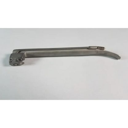 Silver surgical laryngoscope with a curved, metallic handle and an articulated headpiece.