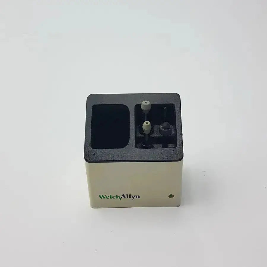 Beige and black welch allyn audio scope charging stand with rectangular body and two white knobs for used medical equipment sale
