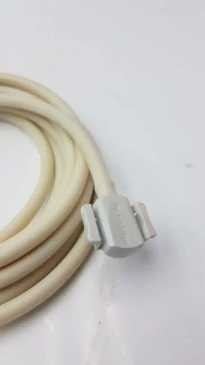 Beige coiled patient monitor cable with a gray plastic connector for Welch Allyn NBP patient monitor