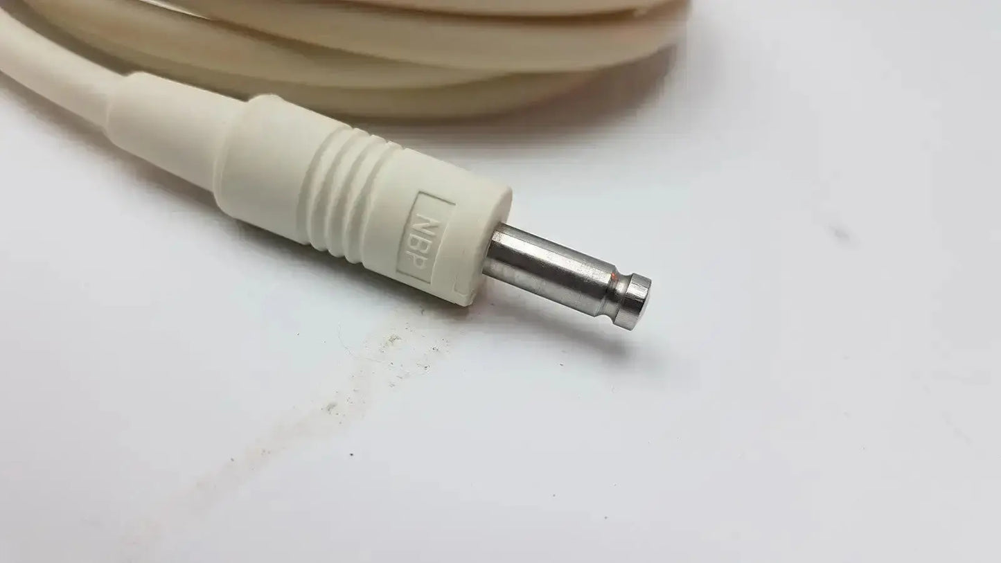 Cream-colored welch allyn patient monitor cable with metallic plug and ribbed plastic connector housing