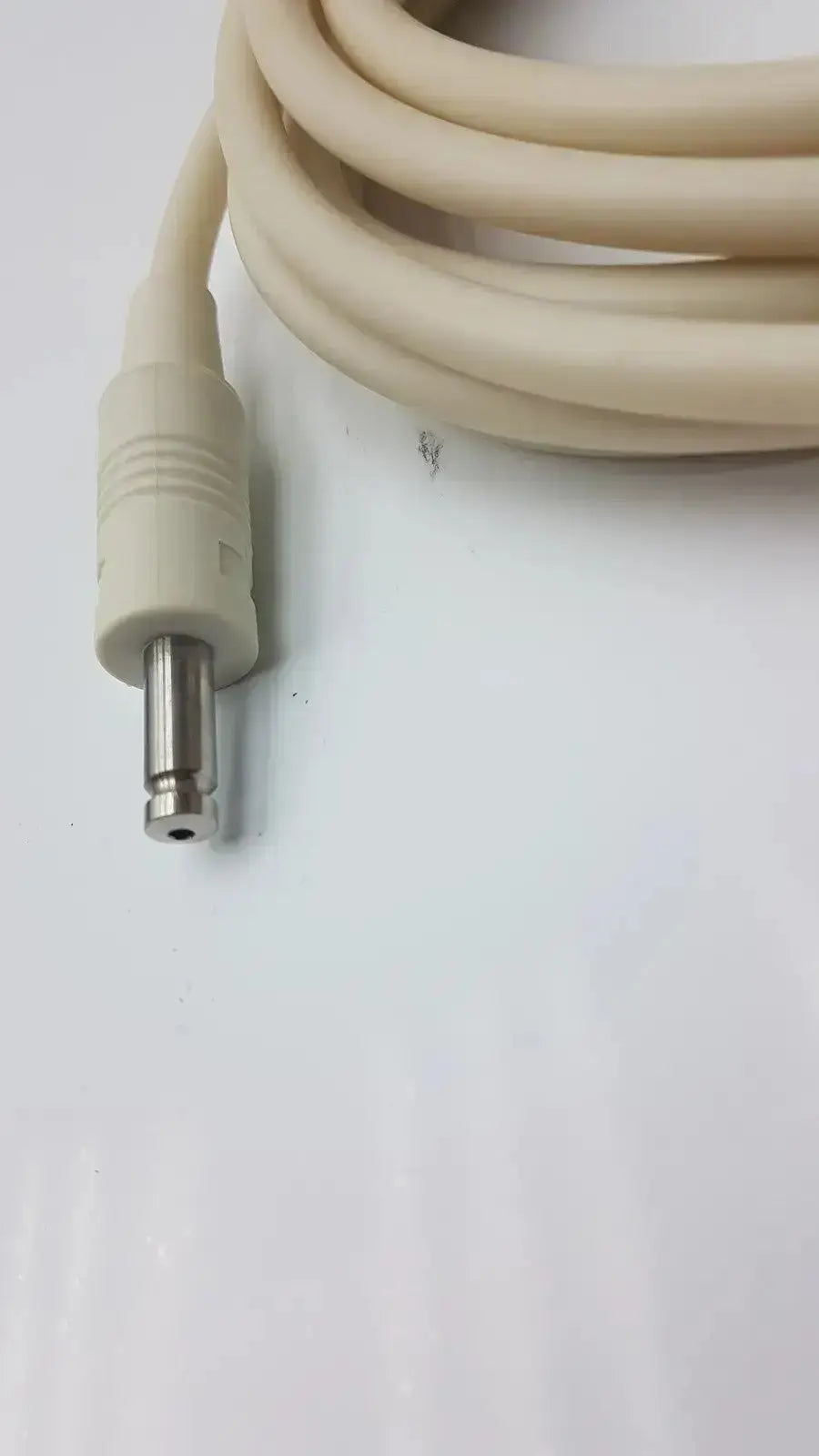 Beige coiled patient monitor cable with metallic 3.5mm jack connector for welch allyn patient monitor use