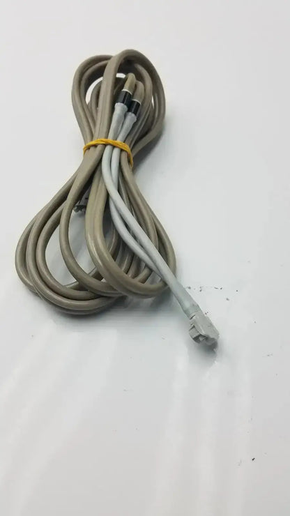 Coiled beige and gray ethernet cable with yellow tie for welch allyn nibp compatible double hose used medical equipment for sale