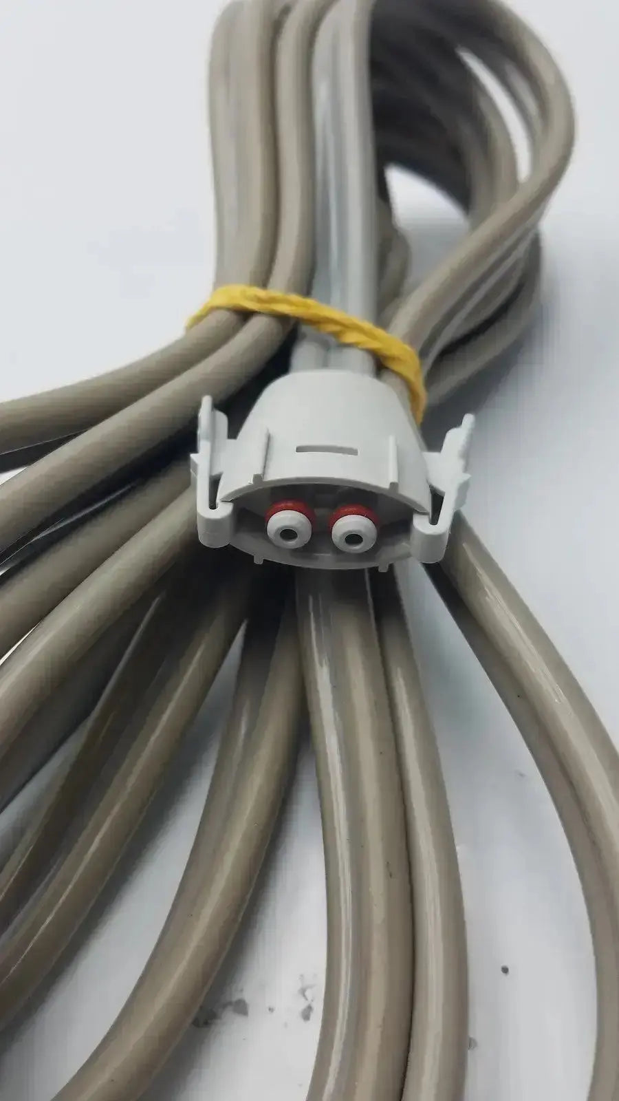 Gray double hose with white connector and red details compatible with welch allyn used medical equipment for sale