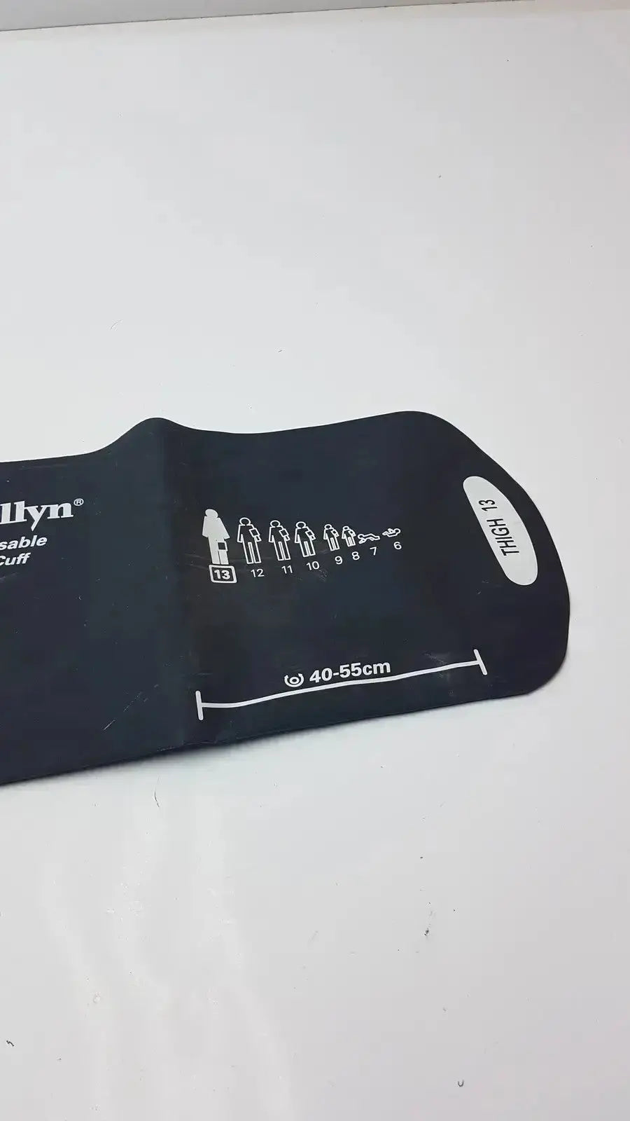 Black welch allyn flexiport reusable blood pressure cuff with white sizing chart and high 13 label for thigh use