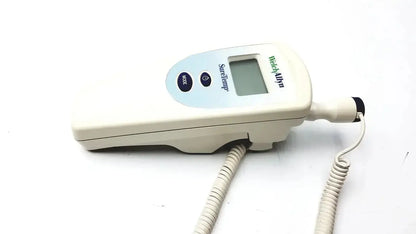 White handheld blood alcohol tester with digital display and blue buttons for buy used medical equipment or pre owned medical equipment