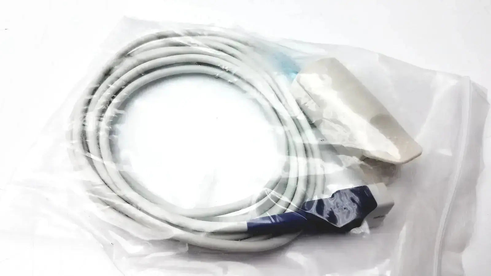 Gray medical cable with blue connector and white sensor for Welch Allyn vital signs patient monitor in clear plastic packaging