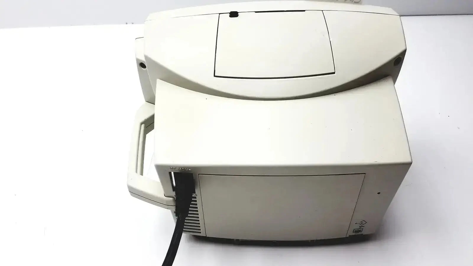 Beige plastic desktop printer with hinged lid and handle in welch allyn vital signs patient monitor accessories