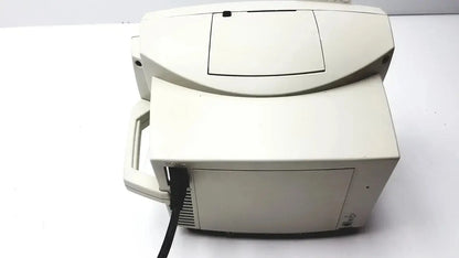 Beige plastic desktop printer with hinged lid and handle in welch allyn vital signs patient monitor accessories