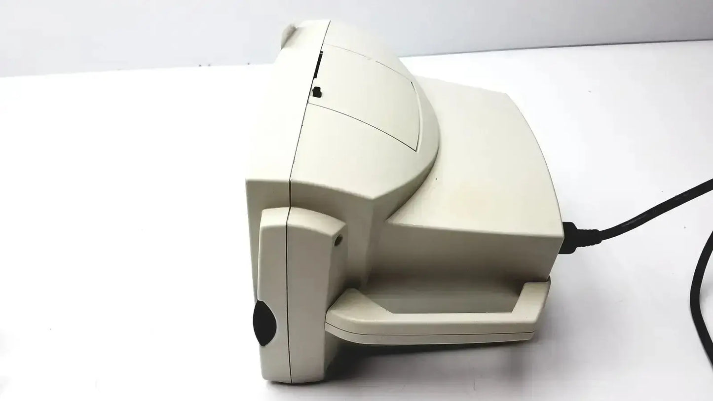 Beige plastic desktop scanner with curved top and handle for welch allyn vital signs patient monitor accessories