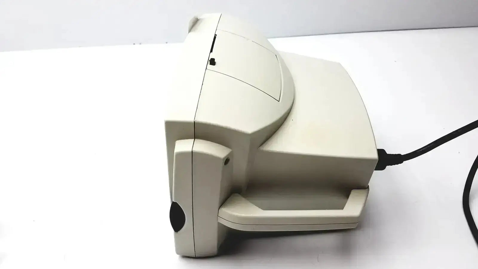 Beige plastic desktop scanner with curved top and handle for welch allyn vital signs patient monitor accessories