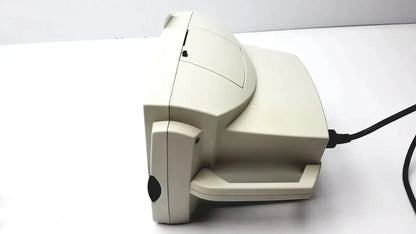 Beige plastic desktop scanner with curved top and handle for welch allyn vital signs patient monitor accessories