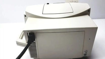 Beige plastic desktop printer with black power cord plugged in for welch allyn vital signs patient monitor accessories