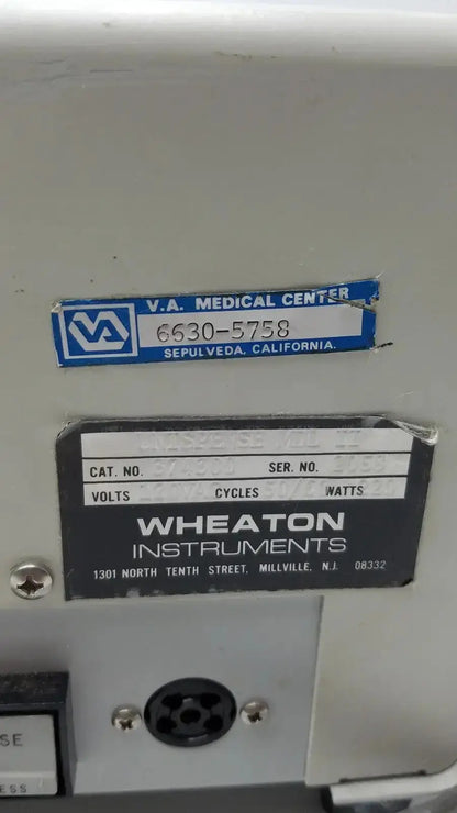 White wheaton unispense ii dose counter medical device with blue and white label from v.a cat no 374300 g-bbdd4-14u