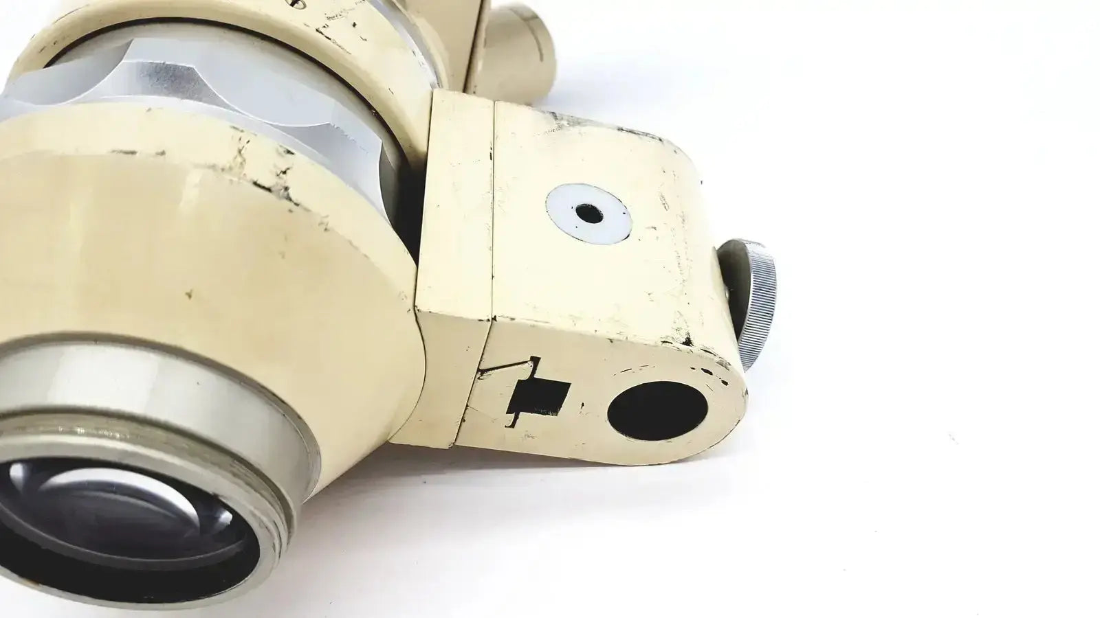 Cream-colored vintage wild heerbrugg m5-26436 microscope with slightly worn finish and metallic accents