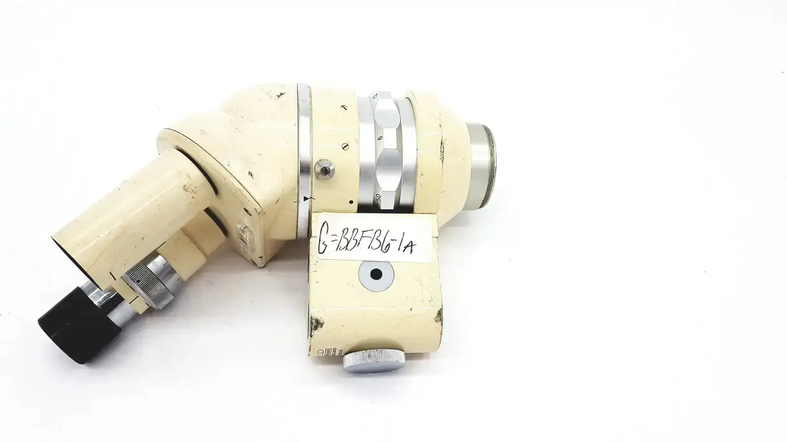 Cream-colored wild heerbrugg m5-26436 microscope with metallic silver accents and black rubberized eyepiece