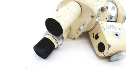 Beige and silver Wild Heerbrugg M5-26436 microscope with black eyepiece and adjustment knobs for precise viewing