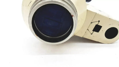 Cream-colored vintage wild heerbrugg m5-26436 microscope binoculars with dark blue lenses and silver metallic rims