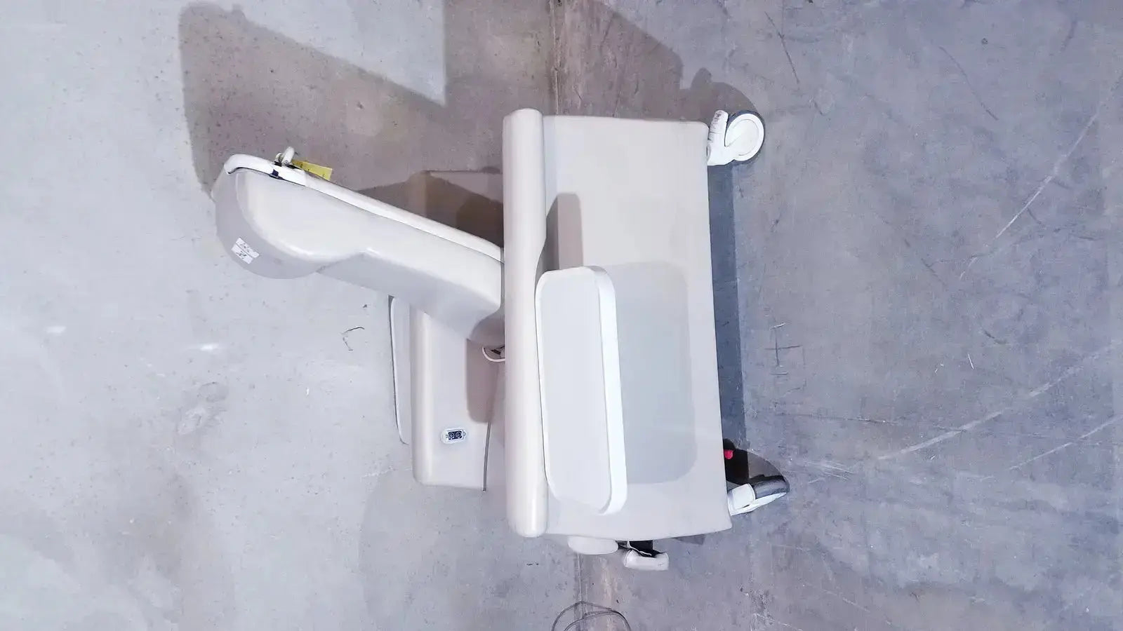 White Winco 694 care recliner dialysis chair with adjustable armrests wheels back massager and side trays