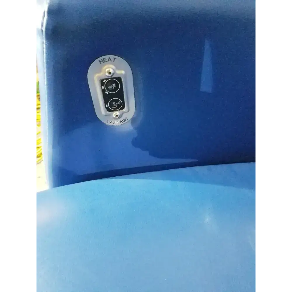Blue inflatable hot tub control panel with white and black heat buttons on winco 694 care recliner dialysis chair