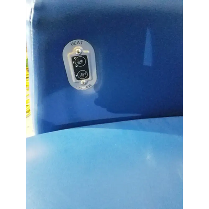 Blue inflatable hot tub control panel with white and black heat buttons on winco 694 care recliner dialysis chair